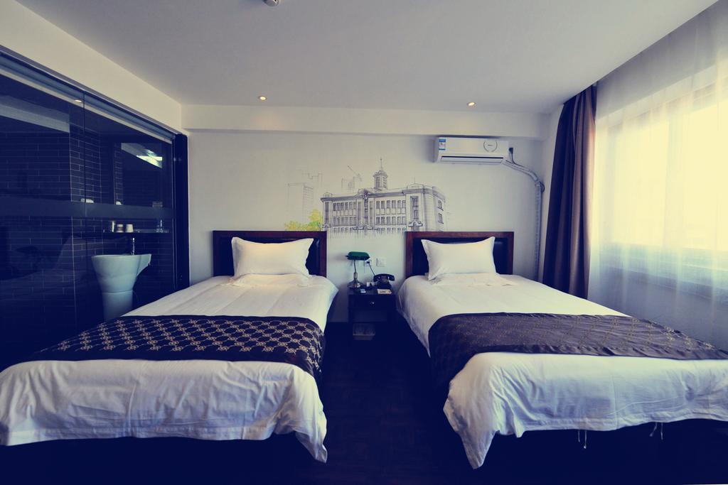 Nostalgiahotel-Tianjinguozhancenter Oda fotoğraf