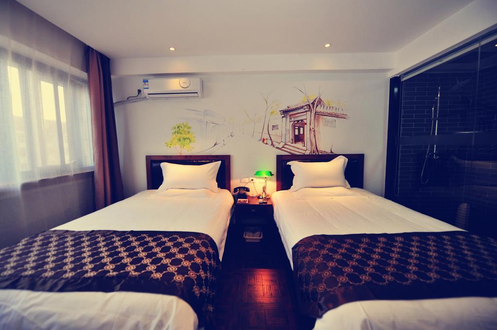 Nostalgiahotel-Tianjinguozhancenter Oda fotoğraf